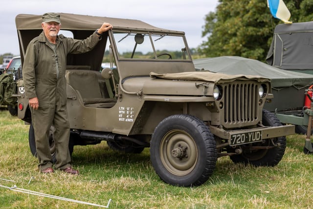 Kevin Maxwell proudly shows off his 1957 Willis Jeep.