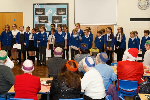 The choir sing some suitably festive pieces during the annual Christmas lunch at Manor Beach Primary School in Cleveleys