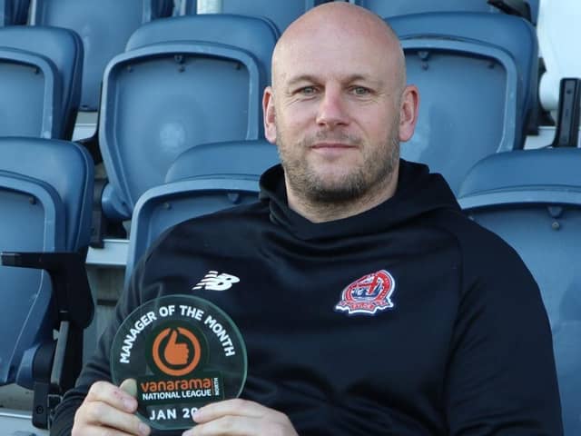 AFC Fylde boss Adam Murray with January's manager of the month award for National League North