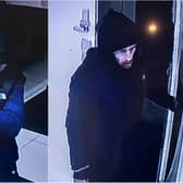 Do you recognise this man? Officers want to speak to him following a burglary at a hotel in Blackpool (Credit: Lancashire Police)