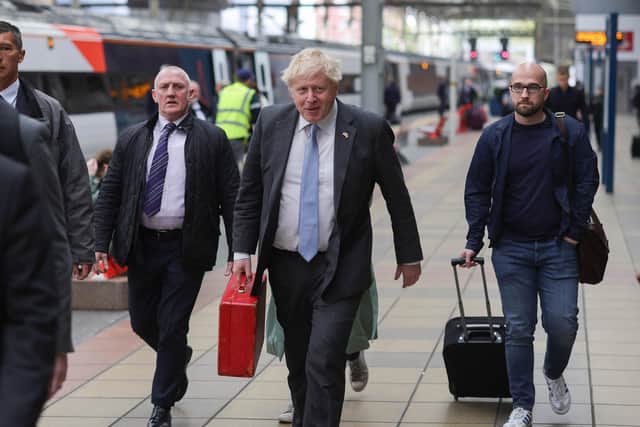 Boris Johnson at Preston train station during his previous visit to the county in April. Picture by Andrew Parsons CCHQ / Parsons Media