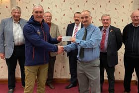 Shaun Haynes presenting cheque to Dave Whitworth of Men’s Shed, Fleetwood supported by members of Saturnian Chapter