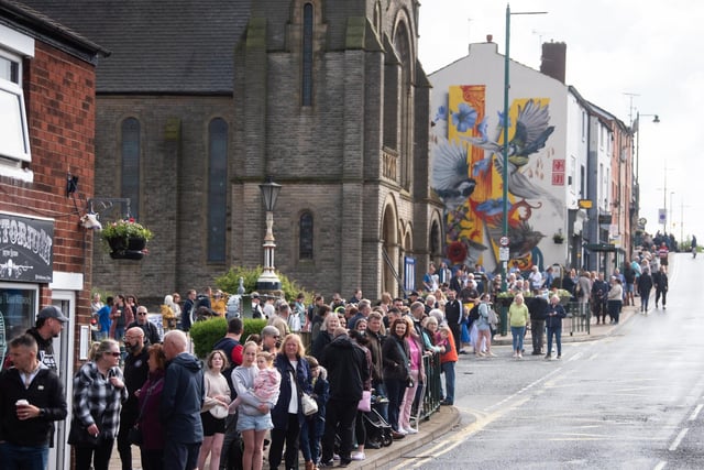 Crowds awaiting the Club Day procession's arrival in Kirkham's main Poulton Street.