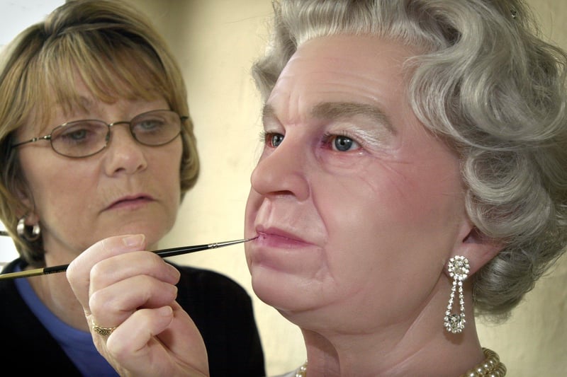 Her Majesty gets a make-over from Bernice Conroy at Louis Tussaud's in Blackpool to make sure she looks her best for her Jubilee celebrations in 2002