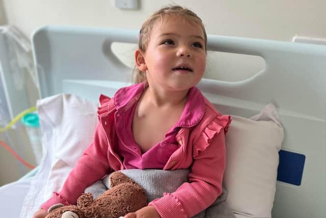 Little Mabel Gregson, 4, during her treatment at St Mary's Hospital in Manchester for Batten Disease.