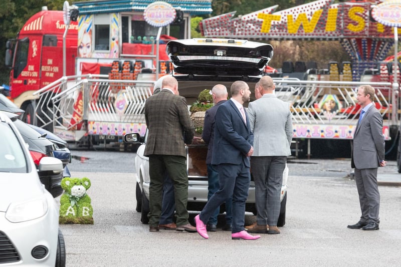 Bella Greer's coffin is carried into Fylde Rugby Club ahead of her funeral service in Lytham