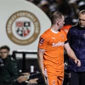 Shayne Lavery speaks with Neil Critchley after being substituted against Bromley. He is to miss the FA Cup tie with Forest Green Rovers. (Photographer Andrew Kearns / CameraSport)