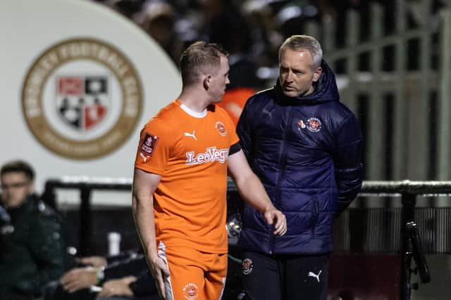 Shayne Lavery speaks with Neil Critchley after being substituted against Bromley (Photographer Andrew Kearns / CameraSport)