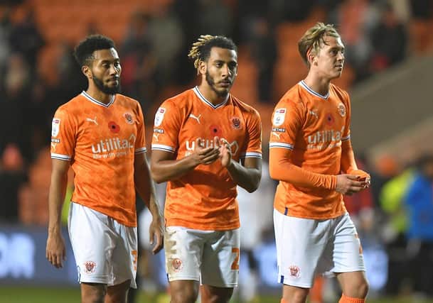 Blackpool's players show their disappointment at the full-time whistle