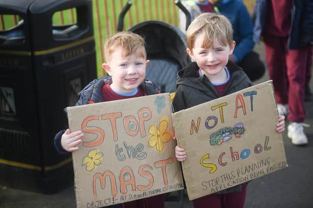Residents protest with parents and pupils of Thornton Cleveleys Baines Endowed Primary School over plans to install a 5G mast outside the outdoor learning and woodland area. George Paine and Teddy Gradwell.