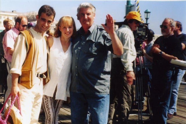 Coronation Street stars Kevin and Sally with local photographer Robert McDougall during filming on North Pier Blackpool