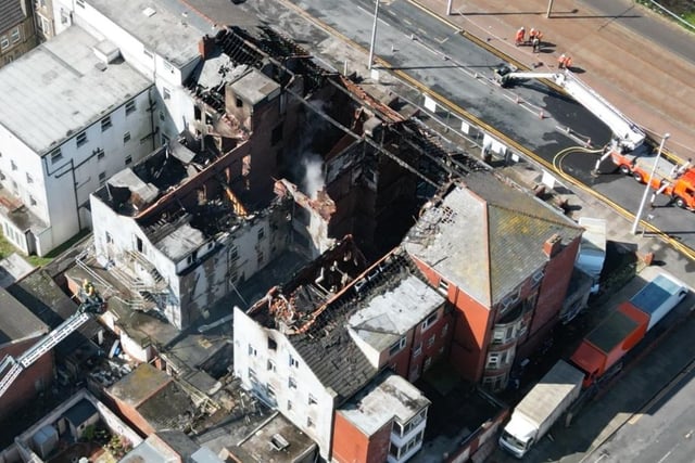 Arial shot as firefighters continue to work to control the devastating blaze at New Hacketts Hotel on Blackpool promenade. Photo by Dave Nelson