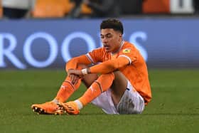 Morgan Rogers sits dejected at the final whistle