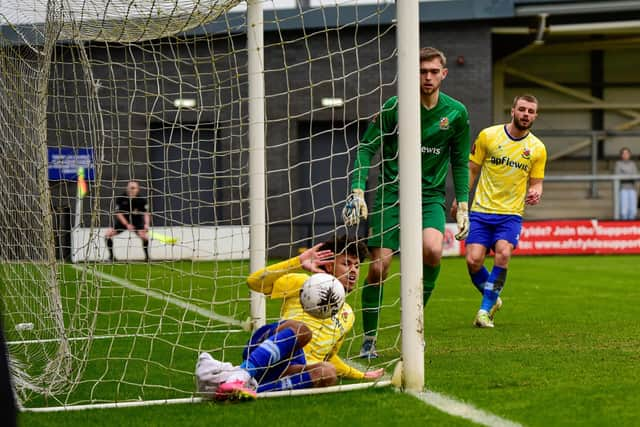 Wealdstone's defence could not prevent AFC Fylde's Nick Haughton from scoring Picture: Steve McLellan