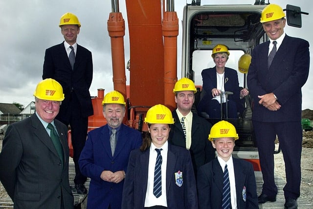Work officially began on the new Fleetwood High School, with representatives from Lancashire County Council, Eric Wright construction, and the school, 2001.
The first JCB arrives, watched by pupil Teri Perkes (12), Managing Director of Eric Wright Group Michael Collier, Head Margaret Dudley, Chair of Governors Des Lund, Chairman Eric Wright, Adam Helsby (12), and County Councillors Chris Cheetham and Clive Grunshaw. PIC BY ROB LOCK