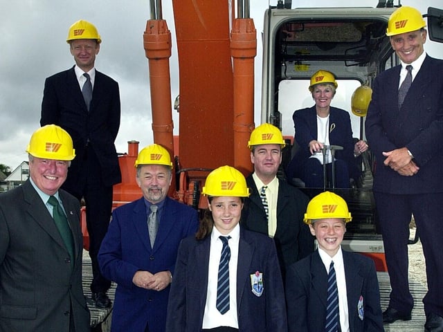 Work officially began on the new Fleetwood High School, with representatives from Lancashire County Council, Eric Wright construction, and the school, 2001.
The first JCB arrives, watched by pupil Teri Perkes (12), Managing Director of Eric Wright Group Michael Collier, Head Margaret Dudley, Chair of Governors Des Lund, Chairman Eric Wright, Adam Helsby (12), and County Councillors Chris Cheetham and Clive Grunshaw. PIC BY ROB LOCK