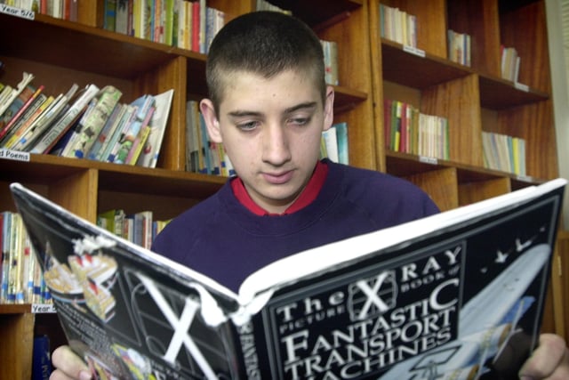 Celebrating the joy of reading is 15-year-old Josh Cooper as he loses himself in a book at Emmanuel Christian School, Singleton