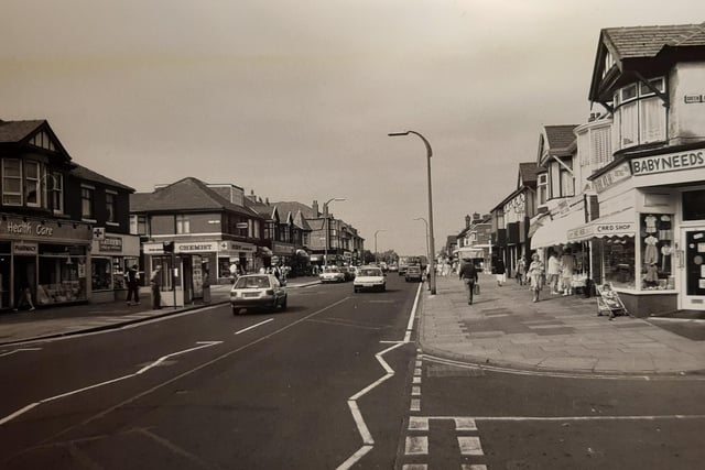 Another view around the same time of Highfield Road. A baby shop is on the corner with a couple of pharmacies over the road.