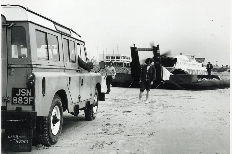 Landrover stuck on the beach being pulled by Hovercraft in 1973