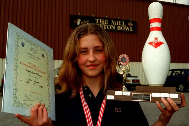 Champion tenpin bowler Zara Glover with some of her trophies in 1996