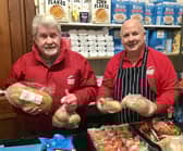 Left to right - Geoff Crosland and Robert Bentwood help organise the community larder