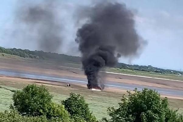 A boat went up in flames on a sandbank near Bulkhead Drive, Fleetwood (Credit: Carl Rosekilly)
