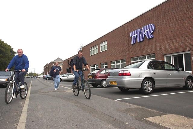 TVR workers leaving the factory as news broke that the company was due to be taken over by a foreign buyer