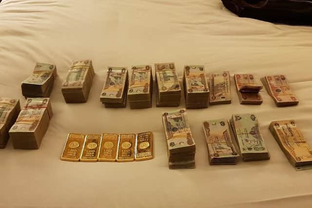 Cash and gold acquired through this criminal activity (Credit: Crown Prosecution Service)