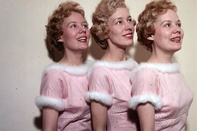 The vocal harmony group The Beverley Sisters, Joy, centre, and her sisters, the twins Teddie and Babs.  (Photo by Hulton Archive/Getty Images)