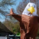 Blackpool Gazette reporter Richard Hunt dressed up as the seagull deterrent at Blackpool Zoo does his best to scare away seagulls. Photo: Kelvin Stuttard
