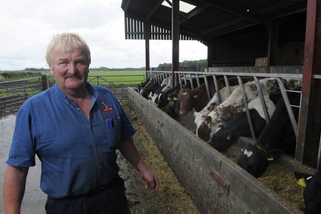Andrew Pemberton with his cattle at Birks Farm, Lytham
