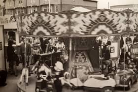 This scene shows the children's fairground opposite Olympia, Kiddies Corner. It is undated but probably mid-1980s