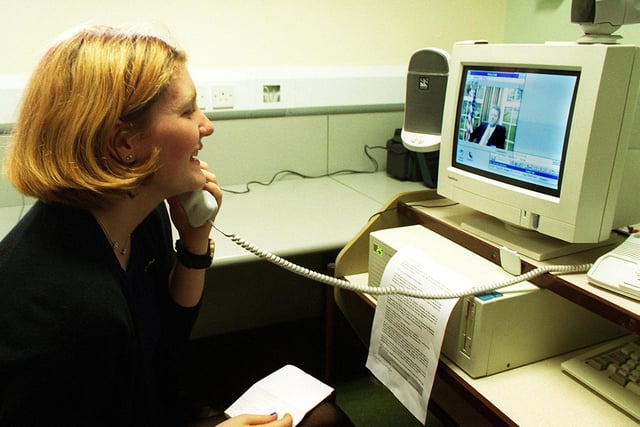 Head Girl at Lytham St Annes High School, Suzanne Cunliffe, talks to 'Bill Clinton' over a video link set up from the school to a conference in Switzerland in 1996