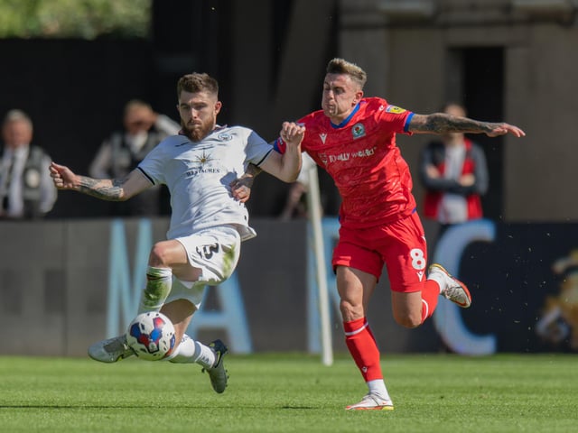 Blackburn Rovers' Sammy Szmodics (right) battles for possession with Swansea City's Ryan Manning (left) 

The EFL Sky Bet Championship - Swansea City v Blackburn Rovers - Saturday 6th August 2022 - Liberty Stadium - Swansea