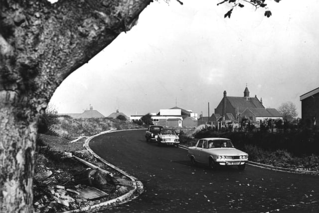 Queensway, the new town centre link road in Poulton, was opened to traffic in 1968 and helped to facilitate the introduction of the town's one way system. Seen here from the direction of Blackpool Old Road it looks positively rural