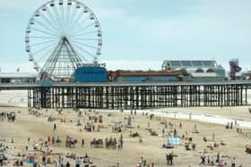 Blackpool beach on a sunny day is fun for all the family. Don't forget your bucket and spade!