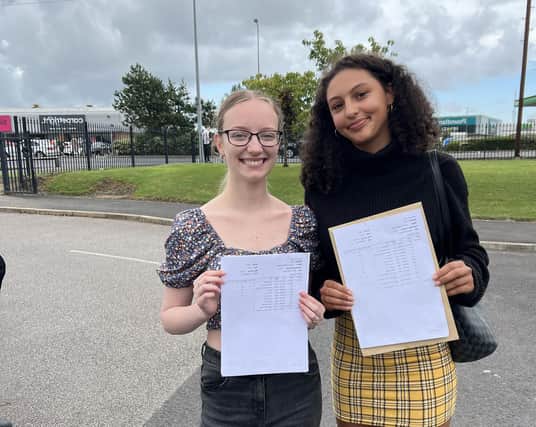 Gracie Rutter and Lauren Russell celebrate their results at St George's High School, Blackpool