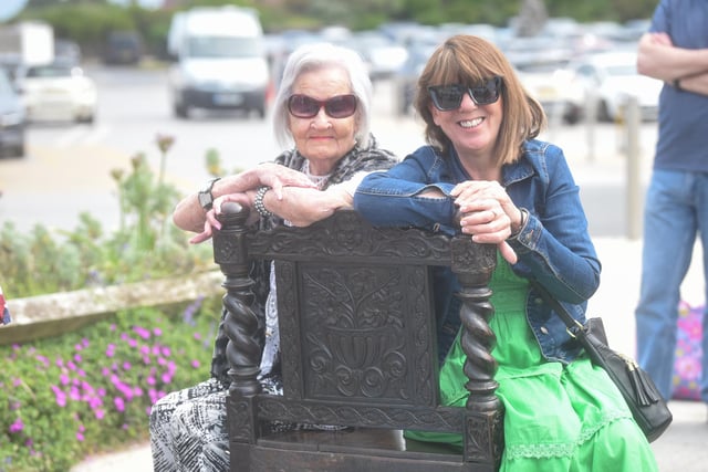 Sheila Ponting and Carol McCann take a break on an antique chair