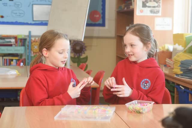Year 3 pupils from Our Lady of the Assumption Primary have been raising money for Ukraine by selling homemade items.  Pictured are Grace Williamson and Hallie Fowler.