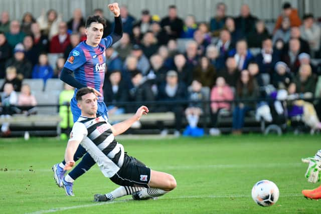 Tom Walker fires in AFC Fylde's first goal Picture: Steve McLellan