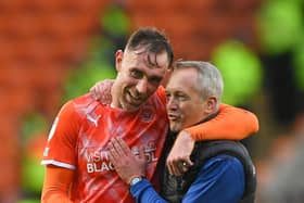 Richard Keogh with Neil Critchley (Photographer Dave Howarth/CameraSport)