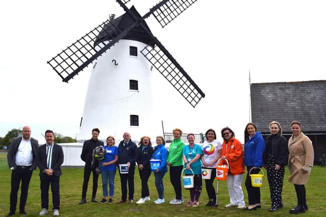 Lytham Festival founders and promoters Daniel Cuffe and Peter Taylor with representatives from the10 charities to benefit from this year's event.