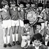 Thames Road School under 11s football team with the Blackpool Primary Schools Football League Southern Division championship shield in 1981
