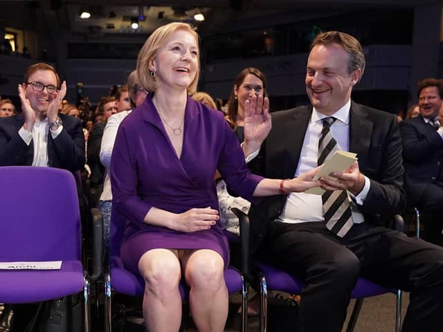 Liz Truss with her husband Hugh O'Leary, at the Queen Elizabeth II Centre in London as it was announced that she is the new Conservative party leader, and will become the next Prime Minister