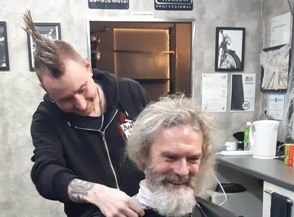 Danny Tunnicliff braves the shave at Ace of Fades barbers in Fleetwood.