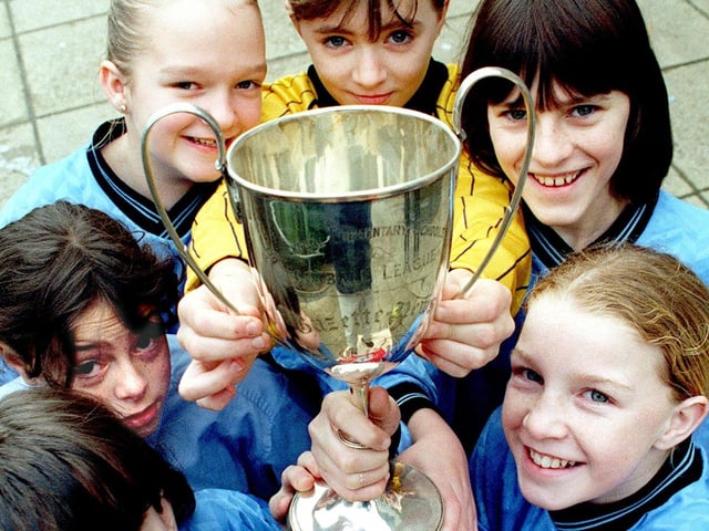 The triumphant U12 girls' football team from Collegiate High School won the Blackpool area Wagon Wheels Cup in 1998