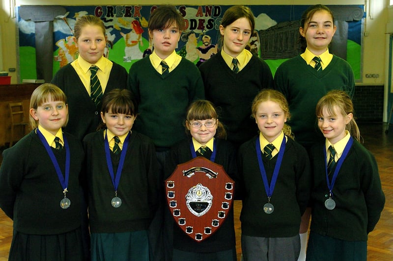 Norbreck Primary School girls football team won the Blackpool Primary Schools Football Association Girls Cup. Back, from left, Perry Smith, Amelia Gaughan, Sam Clare, Justine Briggs. Front, from left, Stephanie Rawlinson, Eleanor Whittaker, Emma Perrett (captain), Abby Webber and Alex Cherry, 2004