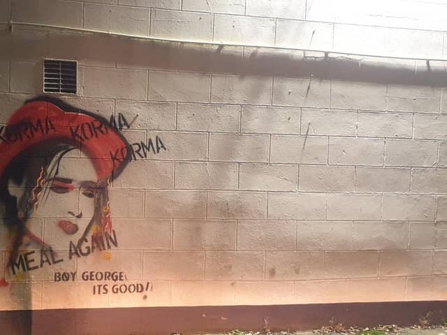 The piece that shows 'Banksy’ special signature on the right-hand side is a tribute to Boy George and reads ‘Boy it’s good!’.