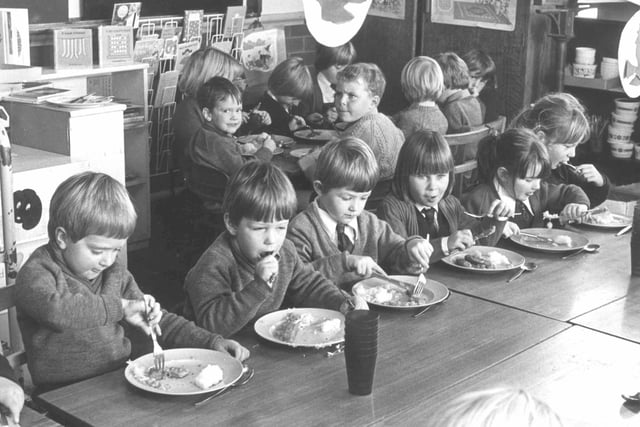 Tucking into their dinners in the late 1970s in Blackpool