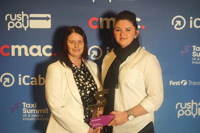Premier Taxis managers  Sabrina Webster and Kym Yates with the award.